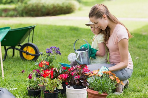 Investigation meeting between garden services staff reviewing job notes